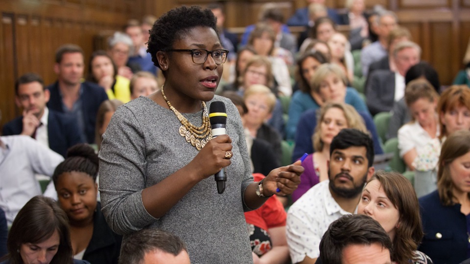Member of the audience asks a question at the One Great George Street Conference Center during a discussion entitled: Family Planning - the rights of girls and women. Co-hosted by The Department for International Development, The Gates Foundation and Save the Children. Wednesday, May 21, 2014.