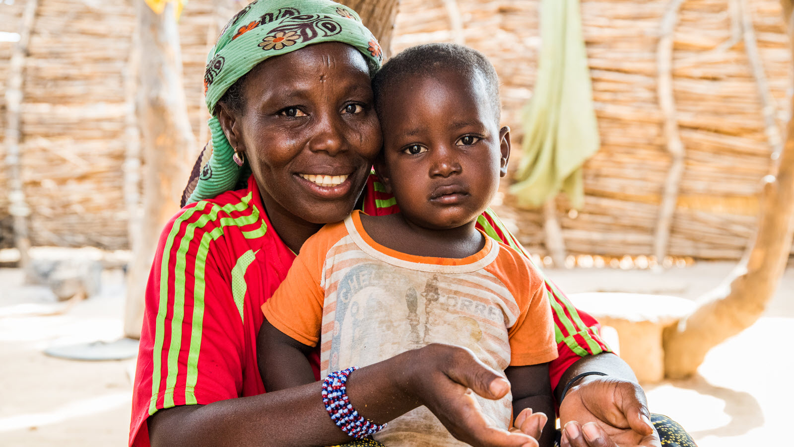 Safi Boubacar, 40 years old with her son Manssour Boubacar, 3 years in the village of Toumandey, Dosso region, Niger on April 23, 2017. Manssour has just received the polio vaccination Biopolio B1/3, albendazole, a medication used for the treatment of a variety of parasitic worm infestations and a vitamin A oral liquid preparation. 