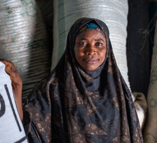 Portrait of Ramatu Alhaji Yusuf, a smallholder farmer and community leader, who empowers other women farmers to adopt climate resilient practices that cultivate improved cowpea varieties in Bichi, Kano State, Nigeria on April 2, 2025.