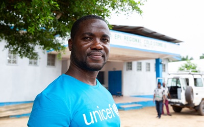 Evans Lablah, a UNICEF immunization specialist, outside the Bong County cold storage facility in Liberia on July 29, 2025.