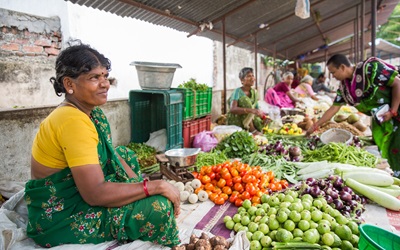 A seller with fresh produce in a local marketplace in Lakshmipuram in Vellore, India, on September 13, 2019.