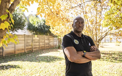 Silver Shabalala, founder of the Coach Mpilo program, at his home in Henley on Klip. A former footballer, Shabalala established the men’s HIV stigma reduction initiative to encourage men to seek treatment and support one another through community-based mentorship and education. The program pairs “Coaches” with “Players” to create support structures focused on HIV awareness, treatment literacy, and reducing barriers to care. Henley on Klip, South Africa. 