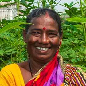 Sushama Das, in Astaranga Village, Odisha State, India, is a beneficiary of improved access to government subsidies, training, and services that have helped her family expand their dairy farm and earn more money.