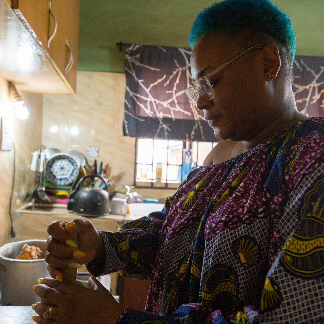 Labake Bode-Matthew preps some meat ahead of lunch in her home in Lagos, Nigeria.